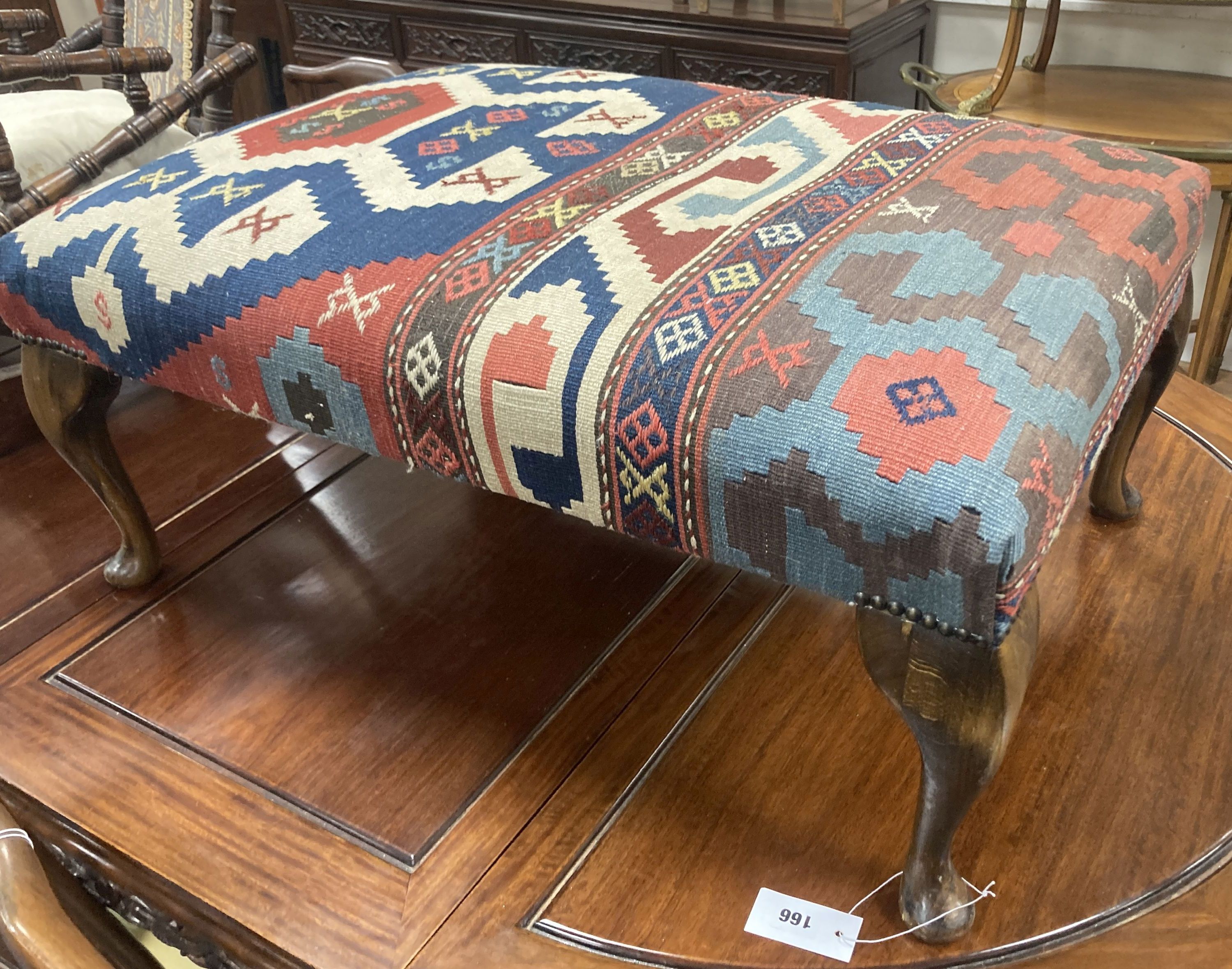 A large rectangular Kelim covered footstool, length 81cm, depth 55cm, height 36cm